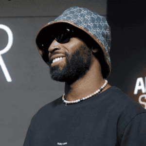 image shows tinie tempah at mclaren artura spider launch with 74people